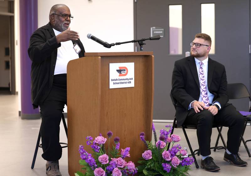 Leroy Mitchell speaks Friday, Aug. 8, 2025, as DeKalb School Board president Christopher Boyes looks on during the grand opening celebration for the school that bears his name, Dr. Leroy A. Mitchell Elementary School in DeKalb.