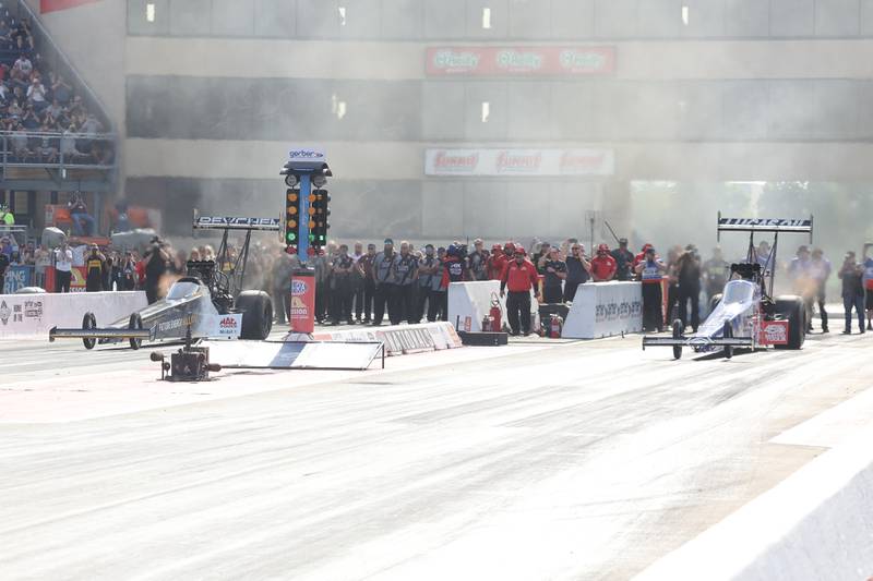 Shawn Langdon, left, and Antron Brown take off in the Top Fuel championship race at the NHRA’s Gerber Collision and Glass Route 66 Nationals at Route 66 Raceway on Sunday, May 19, 2024 in Joliet.