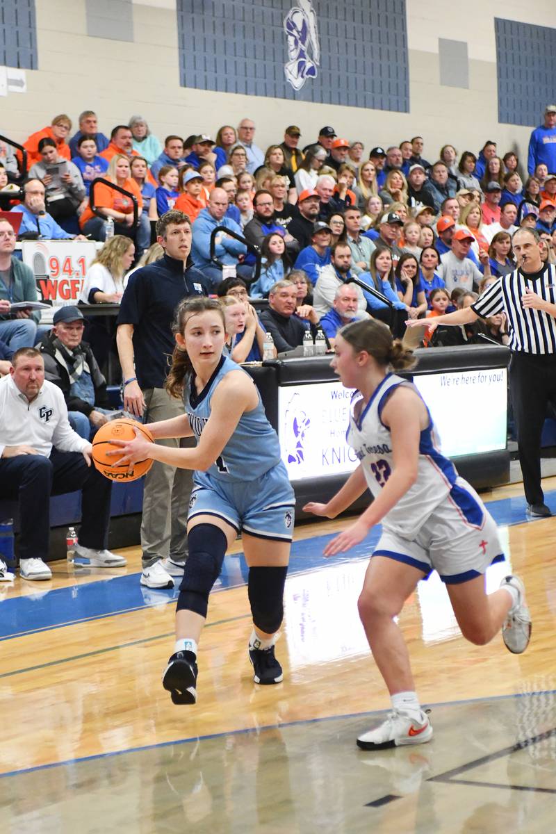 Cissna Park's Julia Edelman looks to pass around St. Teresa's Sophia Wherley during the Timberwolves' 47-35 victory over St. Teresa in the IHSA Class 1A Blue Ridge Super-Sectional on Monday, March 3.