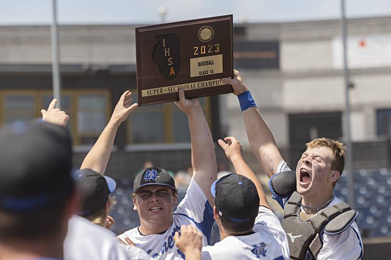 Newman celebrates their 3-2 supersectional baseball game against Chicago Hope Monday, May 29, 2023. Newman will play next week in Peoria for the class 1A state title.