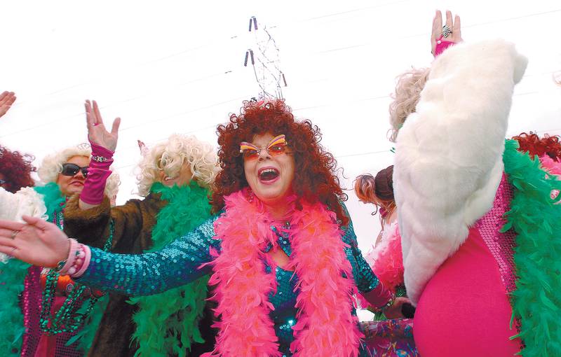 2008 File: The Sweet Potato Queens greet the crowd as they pass through Dixon during the St. Patrick's Day parade.