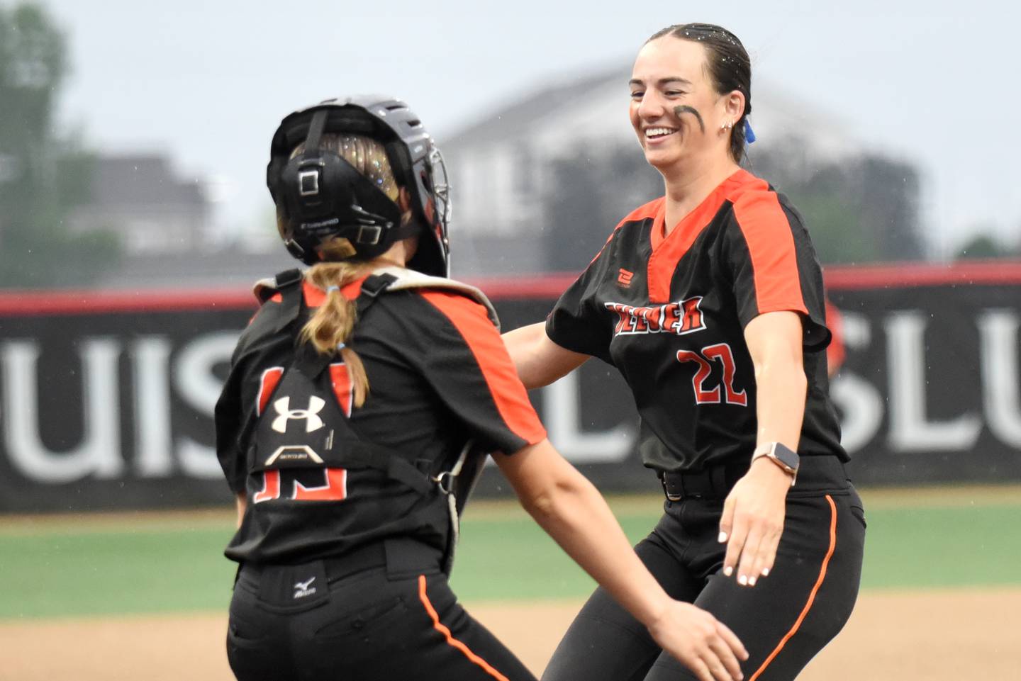 Beecher's Taylor Norkus, right, and MaKenna Albert greet one another in jubilation following the Bobcats' 5-2 10-inning win over Carterville in the Class 2A State championship game Saturday, June 7, 2025 at the Louisville Slugger Complex in Peoria.