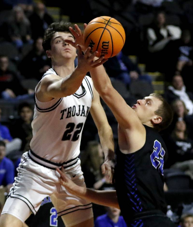 Cary-Grove's Adam Bauer shoots the ball as he drives to the basket against Burlington Central's Jacob Johnson during a Fox Valley Conference basketball game on Tuesday, Jan. 14, 2025, at Now Arena in Hoffman Estates.