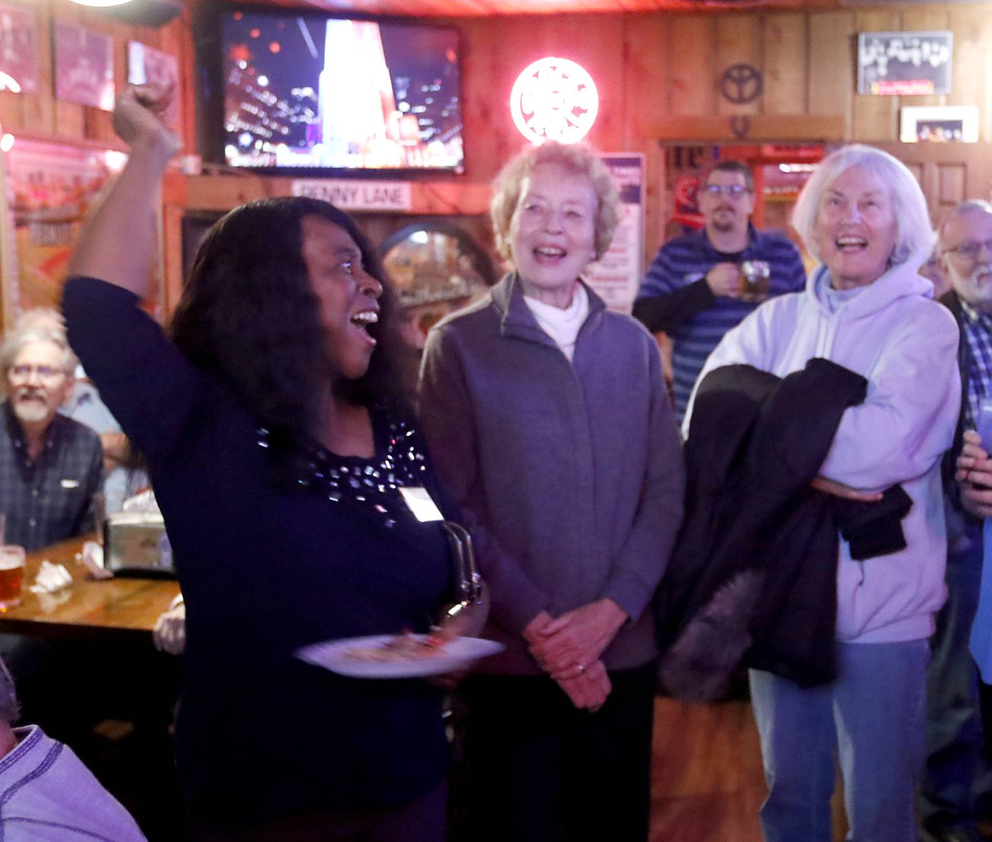 Gloria Van Hof, a candidate for the McHenry County Board in District 2, cheers as results are posted during a Democratic election watch party Tuesday, Nov. 8, 2022, at The Cottage, 6 E. Crystal Lake Ave. in Crystal Lake.