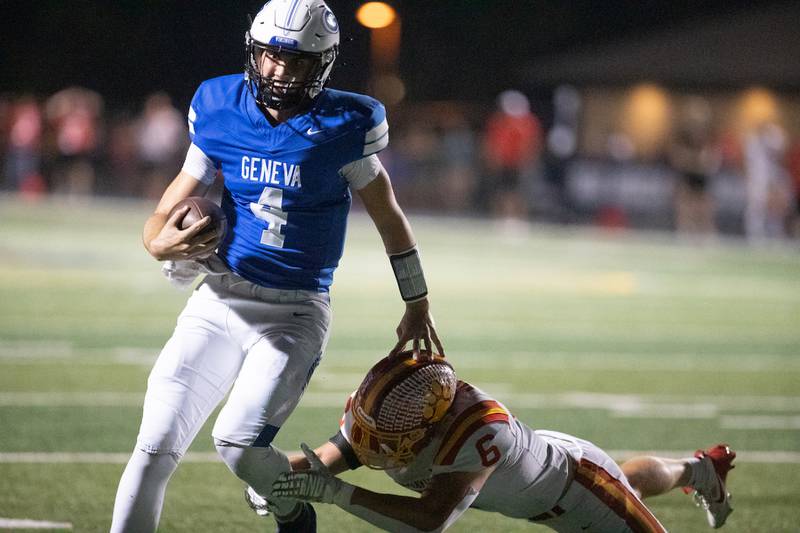 Geneva's Benjamin Peterson is tackled by Batavia's Tony Minnec on Friday, Oct. 3, 2025 in Geneva.