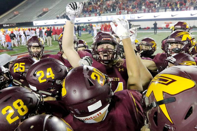 Richmond-Burton celebrates winning the Class 4A state championship after defeating Murphysboro, 50-14, Friday in DeKalb.