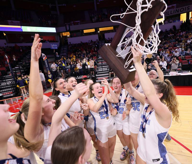 Nazareth Academy celebrates their win over Lincoln during the IHSA Class 3A girls basketball championship game at the CEFCU Arena on the campus of Illinois State University Saturday March 4, 2023 in Normal.