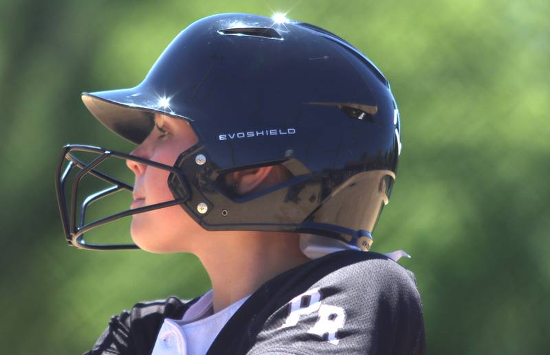 Prairie Ridge’s Ady Kiddy checks in to bat against Harvard during Class 3A softball regional final action at Lions Park in Harvard Saturday.