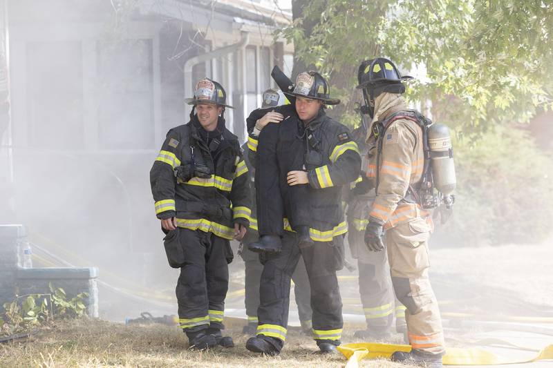 Firefighters make a rescue during a training session Tuesday, Sept. 23, 2025, in Dixon. The training is part of an ongoing effort to standardize leadership and improve emergency response.
