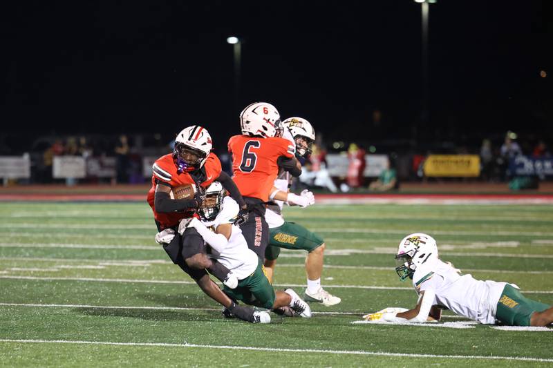 Bradley-Bourbonnais' LyZale Edmon gains yardage before Waubonsie Valley's Caleb Ortiz makes the tackle during the Boilermakers' 35-6 victory over Waubonsie Valley Friday, Sept. 12, 2025.