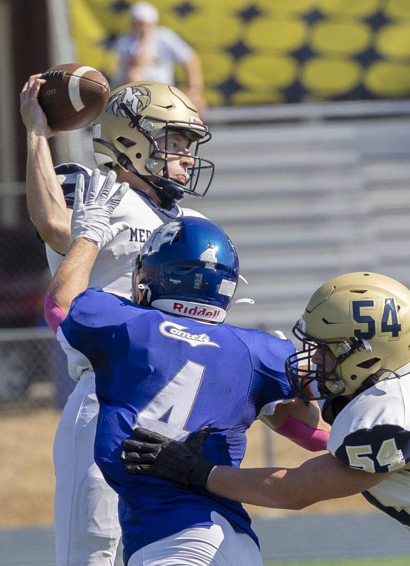 Newman’s Matthew Blackert nearly sacks Mercer County’s John Baldwin Saturday, October 4, 2025.