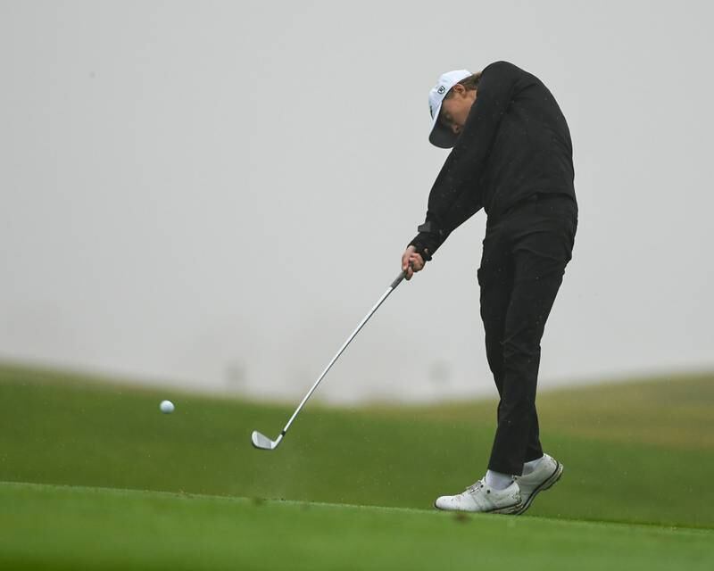Downers Grove North's golfer Colton Wardolw tees off during the West Suburban golf match on Tuesday Sept. 24, 2024, held at Prairie Bluff Golf Course in Crest Hill.