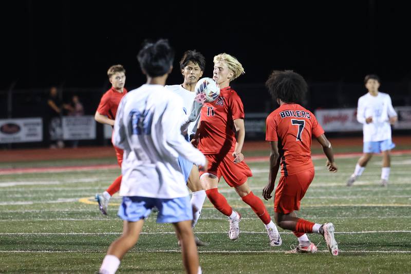 Bradley-Bourbonnais' Cade Hill runs through the ball to win possession during the Boilermakers' 1-0 victory over Kankakee in the All-City matchup on Tuesday, Sept. 9, 2025.