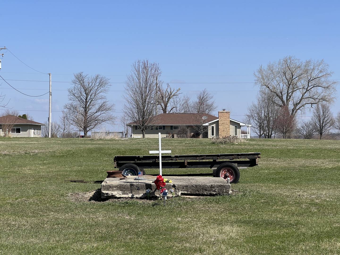 A memorial is seen April 11, 2025, on the Fairdale property where Jacklyn K. Klosa, 69, once lived. She was killed during an EF-4 tornado that struck Fairdale in northwestern DeKalb County on April 9, 2015. Geraldine Schultz, 67, the only other person to die in the storm, lived in a property adjacent to Klosa.