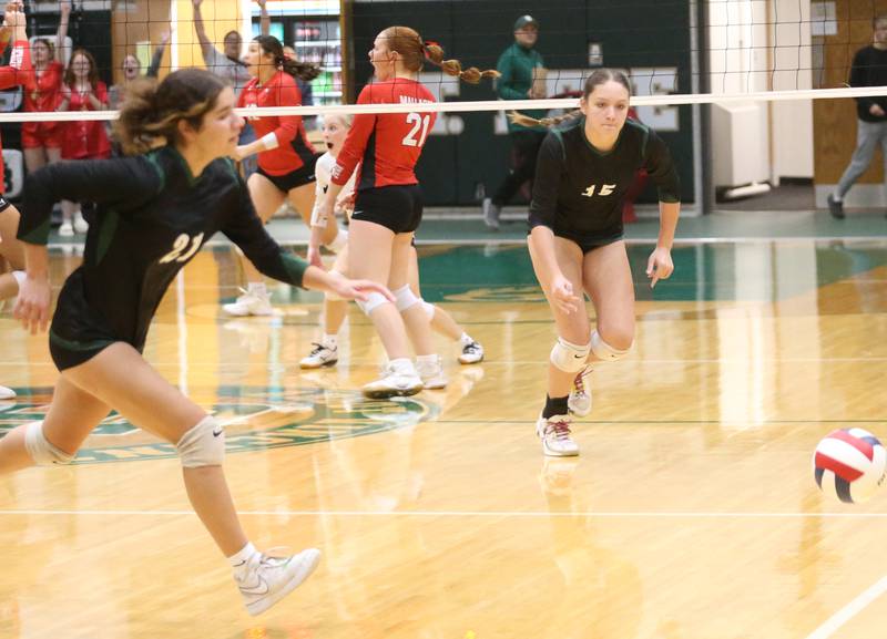 St. Bede's Lily Bosnich and teammate Jillian Pinter race toward the ball as it falls in for a point against Henry-Senachwine during the Class 1A Regional final game on Thursday, Oct. 31, 2024 at St. Bede Academy.