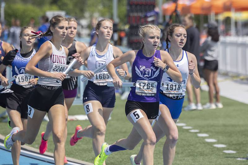 Dixon’s Kate Boss leads the pack early in the 2A 4x800 race Saturday, May 20, 2023 during the IHSA state track and field finals at Eastern Illinois University in Charleston.