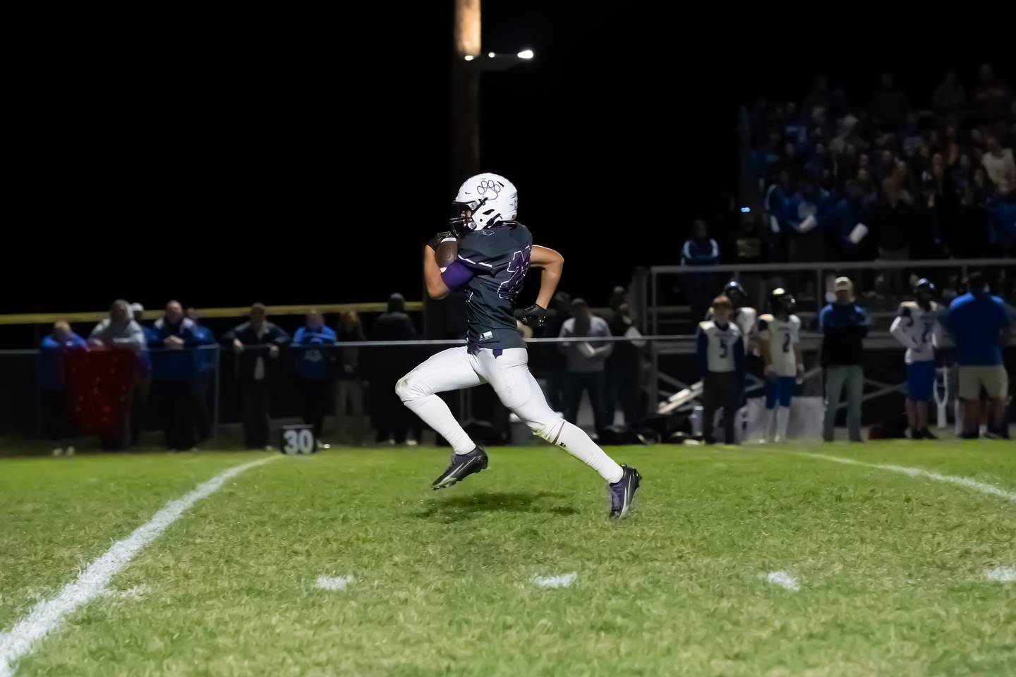 Wilmington’s Hunter Kaitschuck breaks away for a touchdown during the Wildcats’ 49-7 victory over Tri-Valley in the quarterfinal game on Saturday, Nov. 15, 2025.