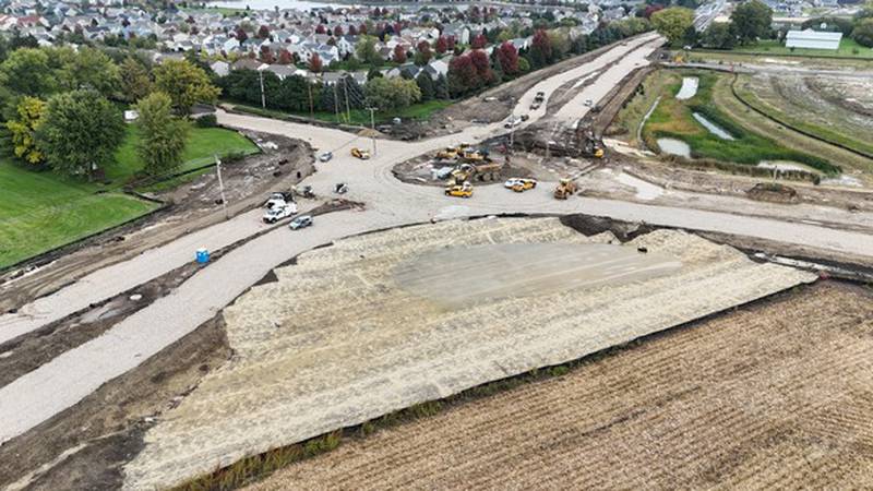 This photo features progress on the work at Wolfs Crossing and Harvey and the remaining utility poles in the roadway that need to be removed to finish the work.