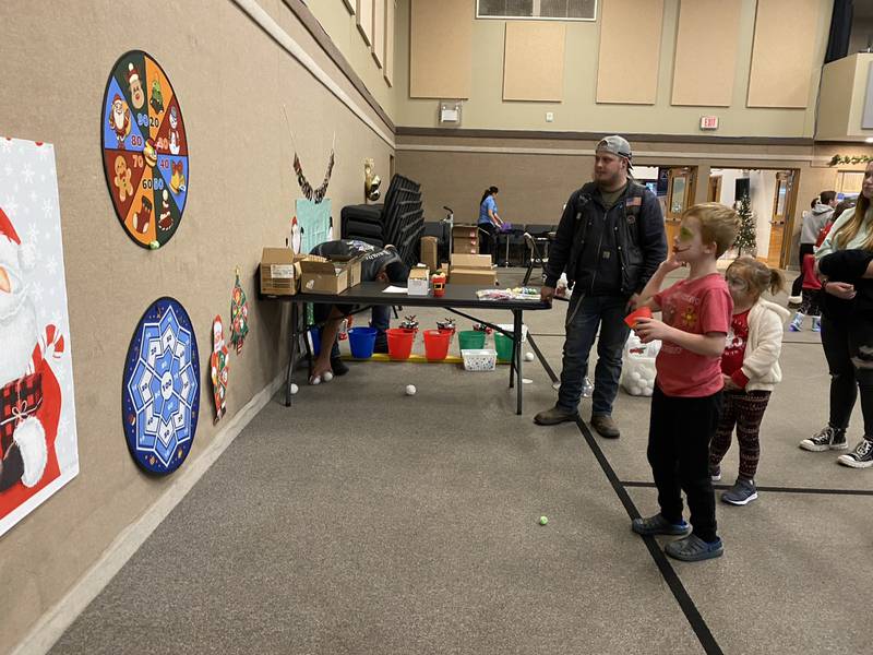 Axel lines up his throw at An Evening with Santa.