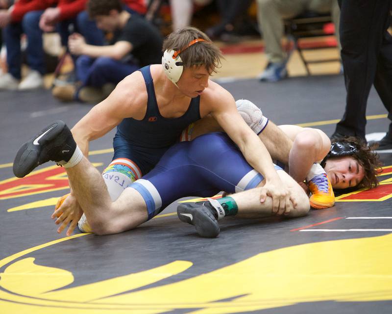 Naperville North's Tyler Sternstein competes against Prospect's Bennett Westfallen in the 157 lb weight class at the Clint Arias Invitational on Saturday, Jan.18,2025 in Batavia.