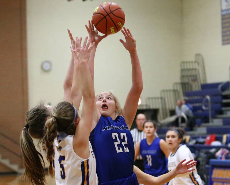Newark's Breannyn Dixon (22) shoots a jump shot over Aurora Central Catholic's Grace Grunioh (5) in the Tim Humes Breakout Tournament on Friday, Nov. 18, 2022 in Somonauk.