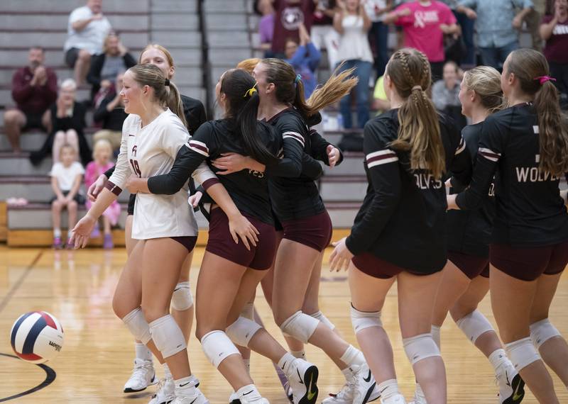 Prairie Ridge teammates celebrate after defeating Hampshire on Thursday, October 2, 2025 at Prairie Ridge High School in Crystal Lake. Ryan Rayburn for Shaw Local