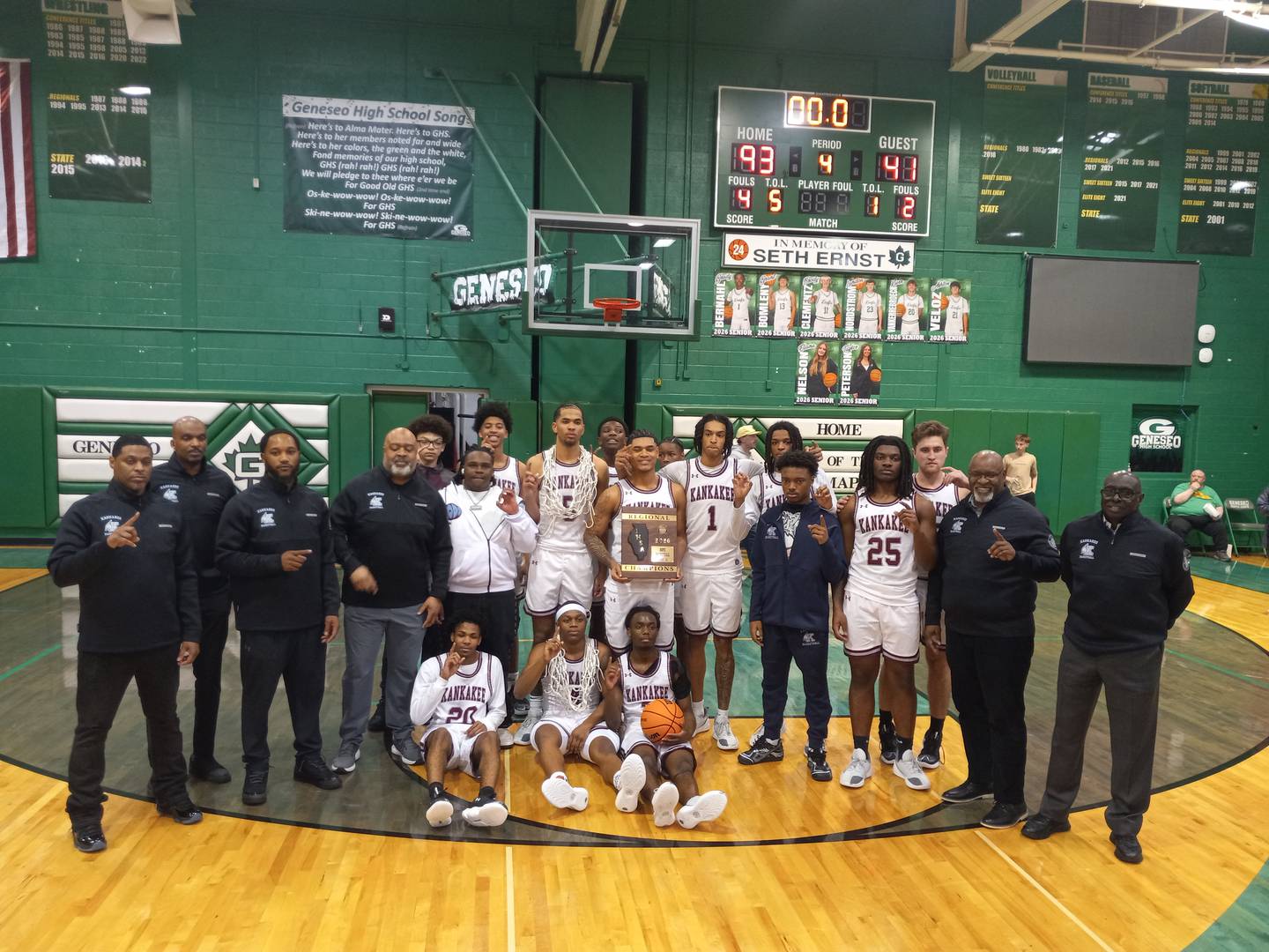 The Kankakee boys basketball team poses with its IHSA Class 3A Geneseo Regional plaque on Feb. 27, 2026.