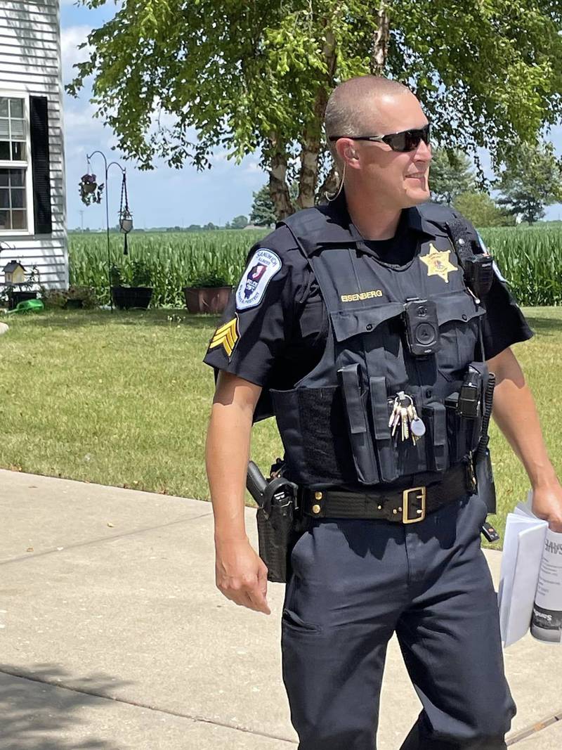 Sandwich Sgt. Jeremy Eisenberg talked to residents in Fairwinds subdivision last month as part of the department’s new Walk & Talk initiative.
