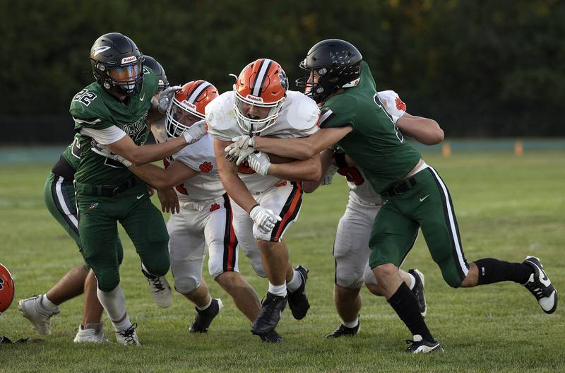 Byron’s Caden Considine punches it in for a score against Rock Falls Thursday, August 28, 2025.