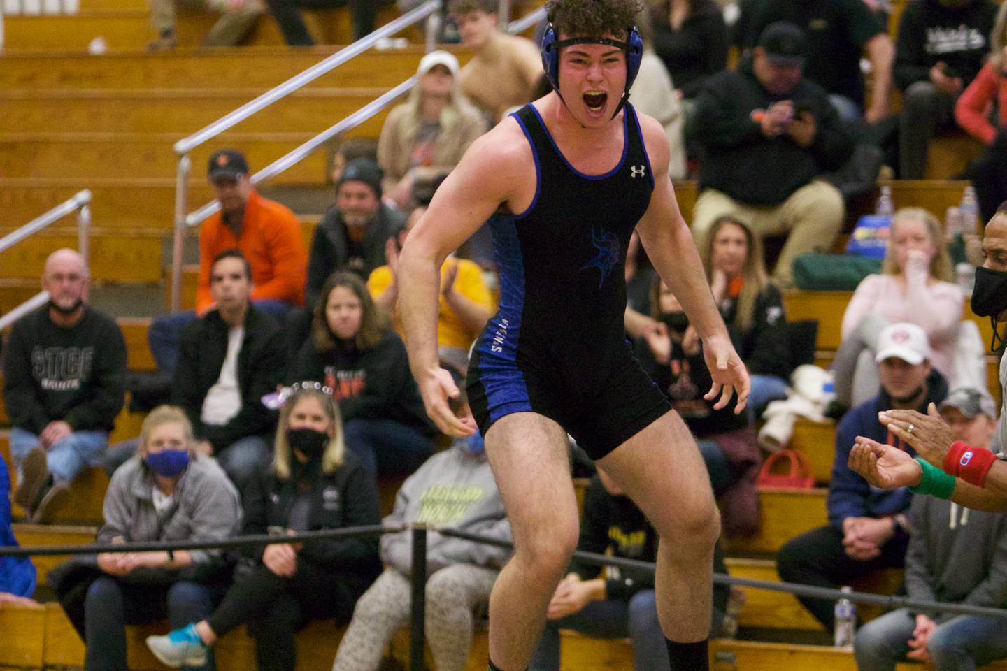 Geneva's John Schmidt celebrates winning the 195-pound championship round at the DuKane Conference at Glenbard North  on Jan. 29, 2022 in Carol Stream.