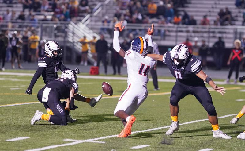 Plainfield North's Omar Coleman (11) kicks a field goal against Oswego during a football game at Plainfield North High School on Friday, Sept. 22, 2023.