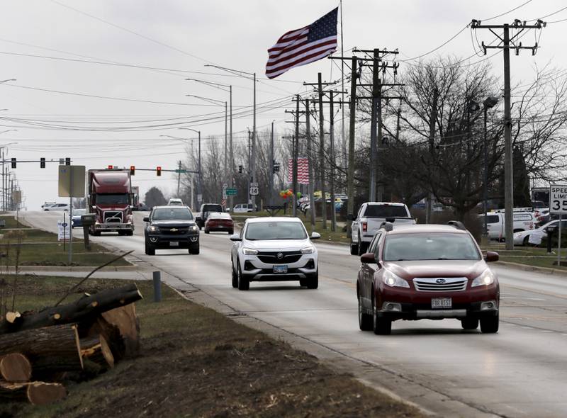 Logs are piled alongside Route 47 on Wednesday, Dec. 11, 2024, in Woodstock as tree removal continues in preparation for the Route 47 construction project.