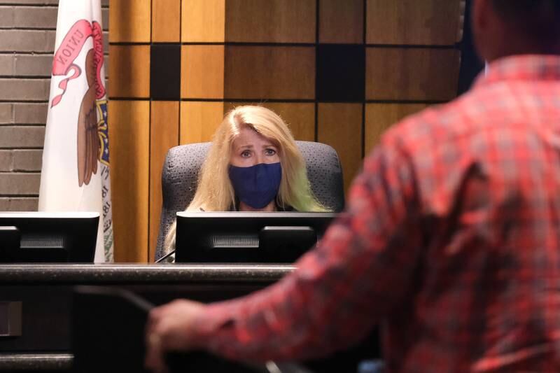 Jan Hallums Quillman, Council at Large, asks Joliet Police Sgt. and Vice President of the Fraternal Order of Police Matt Breen a question regarding the Police Department Citizen Advisory Board proposal at the Council Chambers in Joliet City Hall. Monday Nov. 8, 2021.