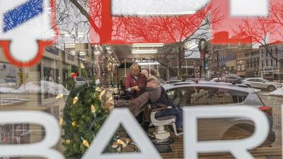 Photos: Longtime Dixon barber hanging up his clippers