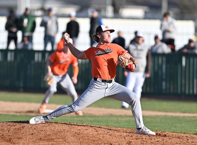 Minooka's Ben Muhich throws a pitch during the non-conference game against Joliet Catholic on Monday, March. 11, 2024, at Joliet.