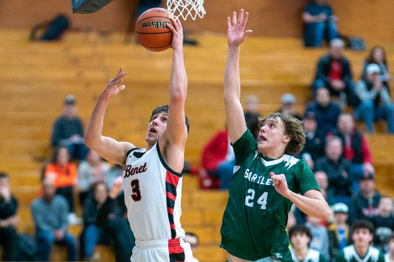 Benet’s Brady Kunka (3) drives to the basket on a backdoor cut against Bartlett's Dimitre Petrasiunas (24) during the 4A Addison Trail Regional final at Addison Trail High School in Addison on Friday, Feb 24, 2023.