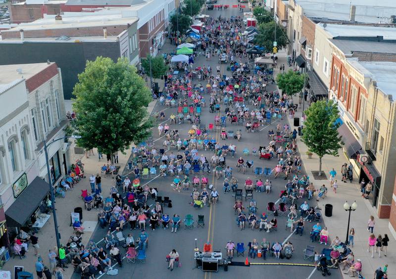 An aerial vew of the crowd that attended the 2025 season opening concert featureing Mae Estes during the "Down on Main Street" concert on Friday, June 20, 2025 downtown Princeton. The free public music series continues July 18 with the Dave Matthews Band. On Aug. 8, the party turns classic with Face 2 Face, a tribute to Elton John and Billy Joel. Sept. 4 brings the groove with Electric Avenue, a dynamic band known for their funk, soul and classic rock covers that get everyone dancing and singing along. The series closes with a festive Oktoberfest celebration on Oct, 18, featuring the lively Heidelberg German Band.