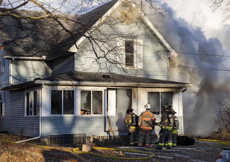 Firefighters from the area battle a fire Sunday, Jan. 19, 2025, at 550 Mill Street in Emerson.