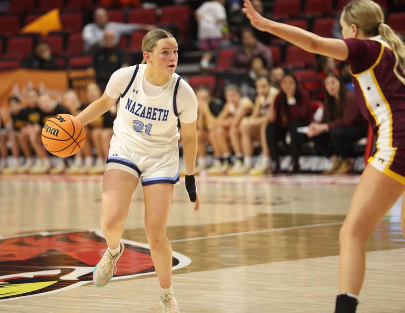 Nazareth's Lyla Shelton looks to pass around Loyola during the Class 4A State girls basketball championship game on Saturday, March 7, 2026 at CEFCU Arena in Normal.