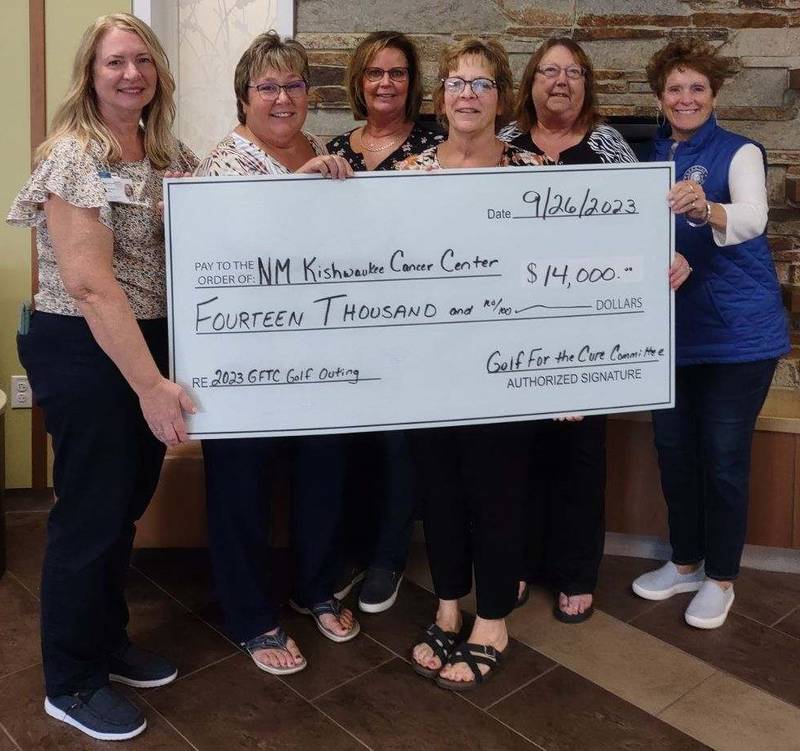 (From left) Kishwaukee Cancer Center Foundation employee Michelle Scheri, Golf Fore the Cure committee members Steff Barringer, Denise Frost, Cheri Johnson, Cindy Monsess, and Peg Kopec