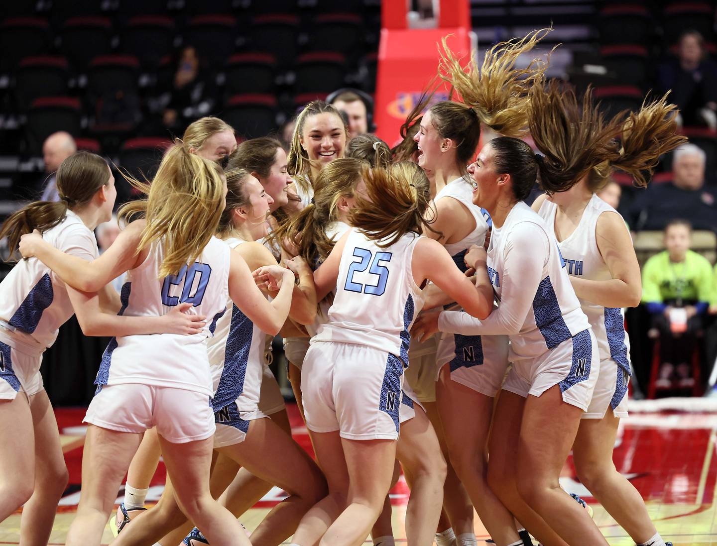 Nazareth Academy celebrates their win over Lincoln during the IHSA Class 3A girls basketball championship game at the CEFCU Arena on the campus of Illinois State University Saturday March 4, 2023 in Normal.