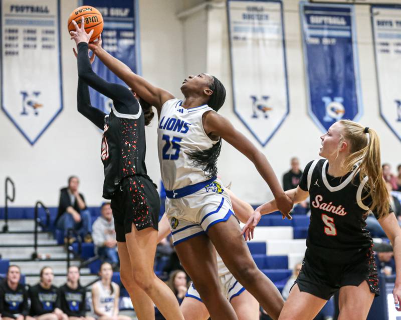 Lyon's Nora Ezike (25) goes up on a rebound attempt during their Coach Kipp's Hoopfest basketball game between Lyons at St Charles East. Jan 18, 2025 in La Grange.