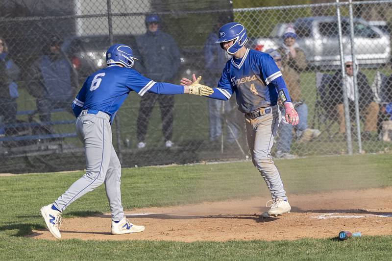 Princeton’s Abram Longeville (left) and Hunter Spiegel celebrate both scoring on a double by Braden Shaw against Newman Monday, April 6, 2026.