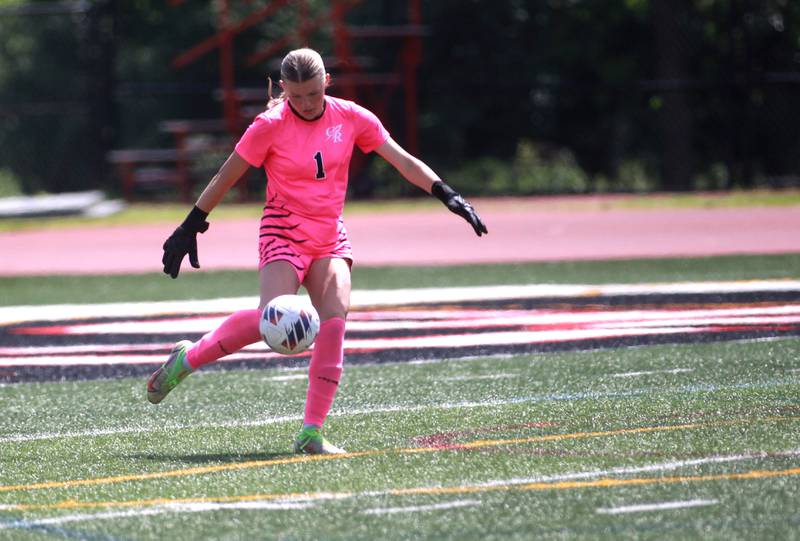 Burlington Central goal keeper Kenzie Lorkowski kicks the ball during the Class 2A state semifinal game against Crystal Lake Central at North Central College in Naperville on Friday, May 31, 2024.
