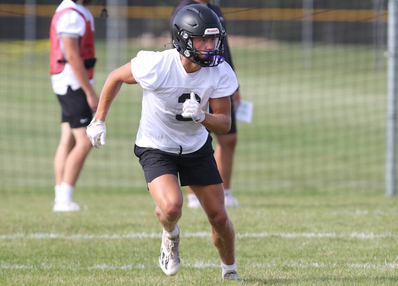 Sycamore receiver Carter York heads out on a route during practice Monday, Aug. 7, 2023, at Sycamore High School.