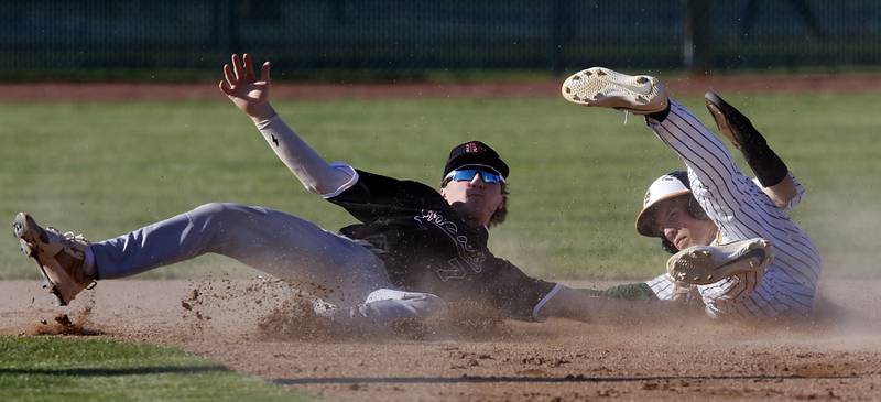 Prairie Ridge's Gabe Winkelman tags out Crystal Lake South's Anthony Amici as he tries to steal second base during a Fox Valley Conference baseball game on Friday, May 15, 2026, at Crystal Lake South High School.
