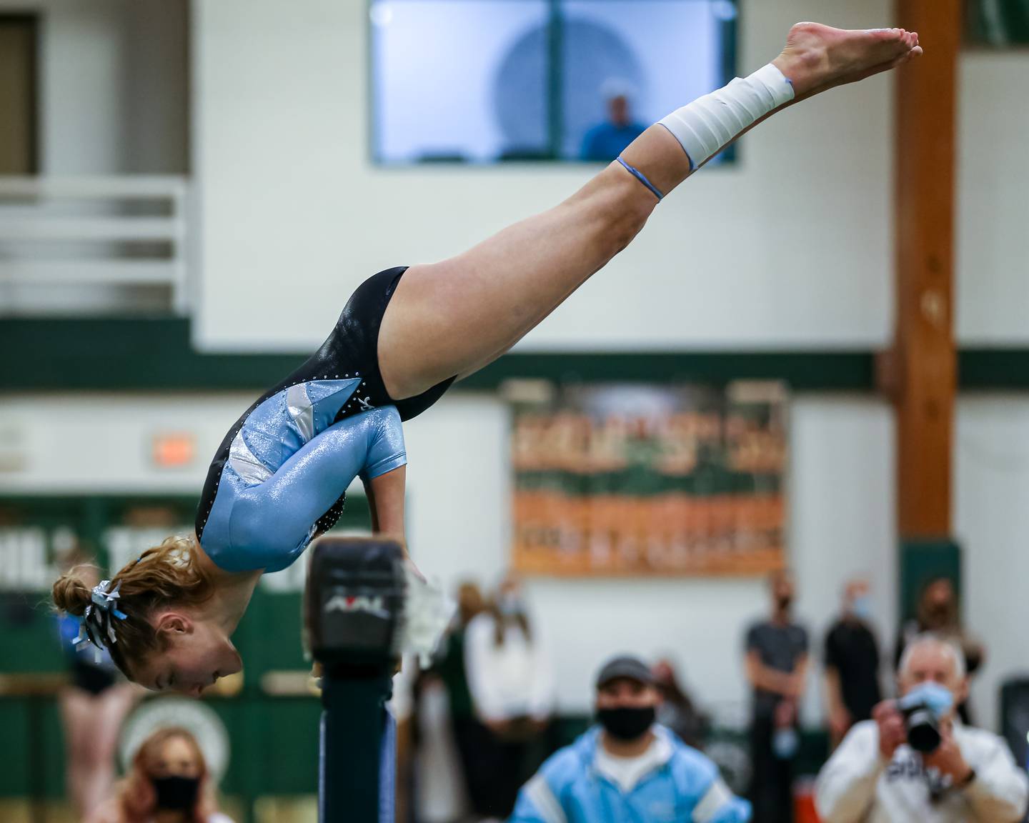 Willowbrook's Hanna Mitrick performs on the balance beam during the Glenbard West Sectional. Feb 10, 2022.