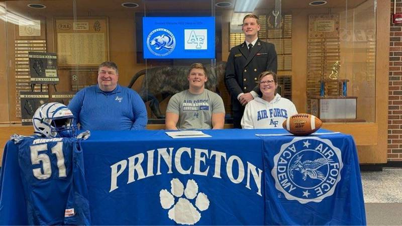 Princeton senior Bennett Williams (front center) was joined by his parents, Mark and Cheryl Williams and his brother, Mack< for his signing day with the Air Force Academy on Friday.