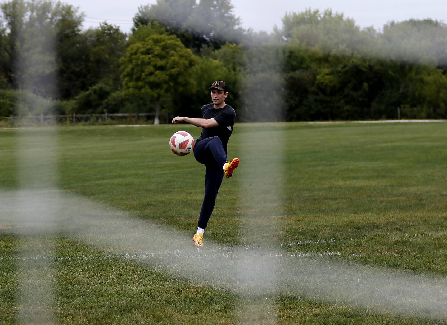 Hunter Gertz practices his kicking on Thursday, Aug. 29, 2024, at Tomaso soccer fields in Huntley. The Huntley Park District is asking residents to approve a $18 million bond referendum on the November 5, 2024, general election ballot to improve, equip and maintain the parks and facilities.