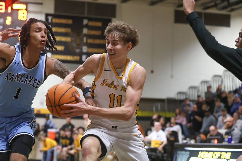 Joliet West’s Luke Grevengoed works he’s way in the paint against Kankakee on Wednesday, Feb. 18, 2026 in Joliet.